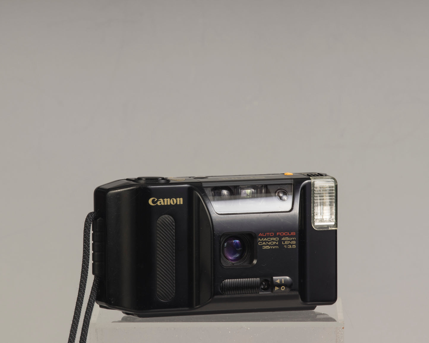 The Canon Sprint is an auto focus 35mm film point-and-shoot camera featuring a fixed 35mm f3.5 lens