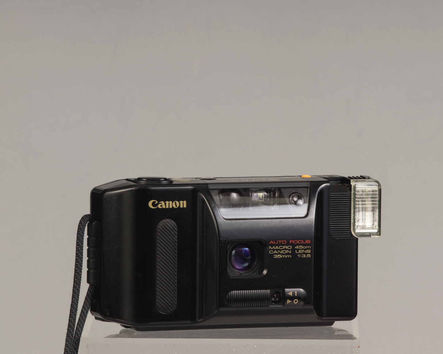 The Canon Sprint is an auto focus 35mm film point-and-shoot camera featuring a fixed 35mm f3.5 lens