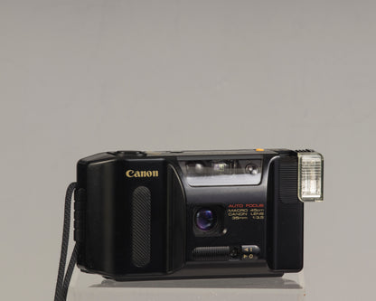 The Canon Sprint is an auto focus 35mm film point-and-shoot camera featuring a fixed 35mm f3.5 lens