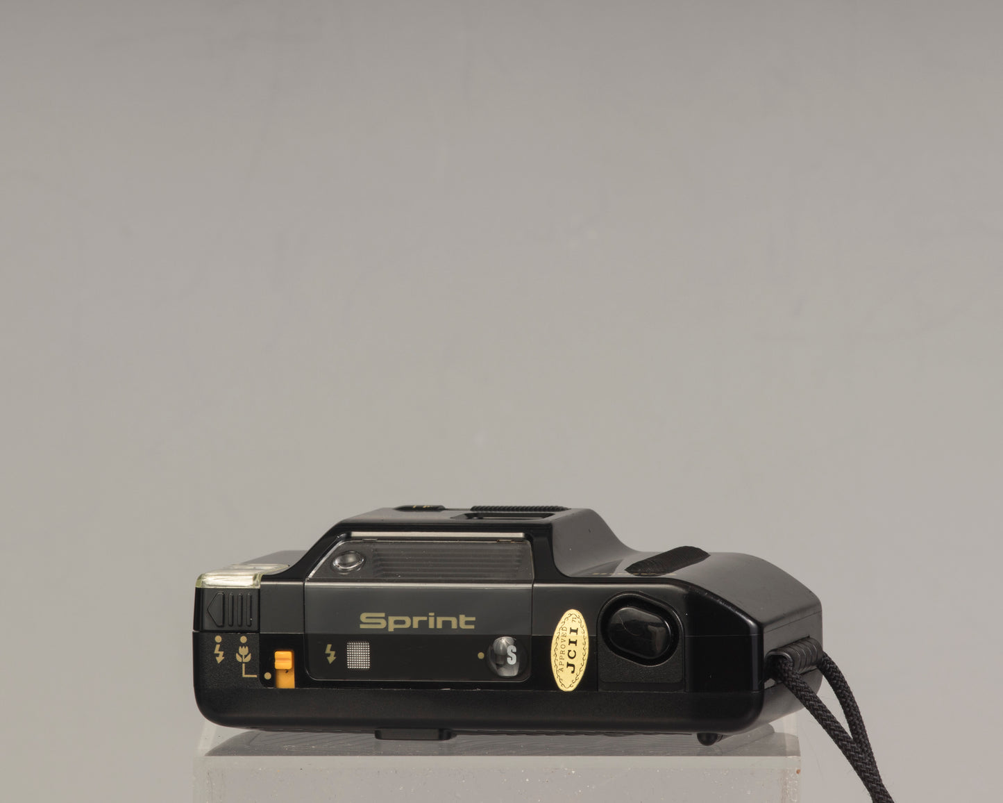 The Canon Sprint is an auto focus 35mm film point-and-shoot camera featuring a fixed 35mm f3.5 lens