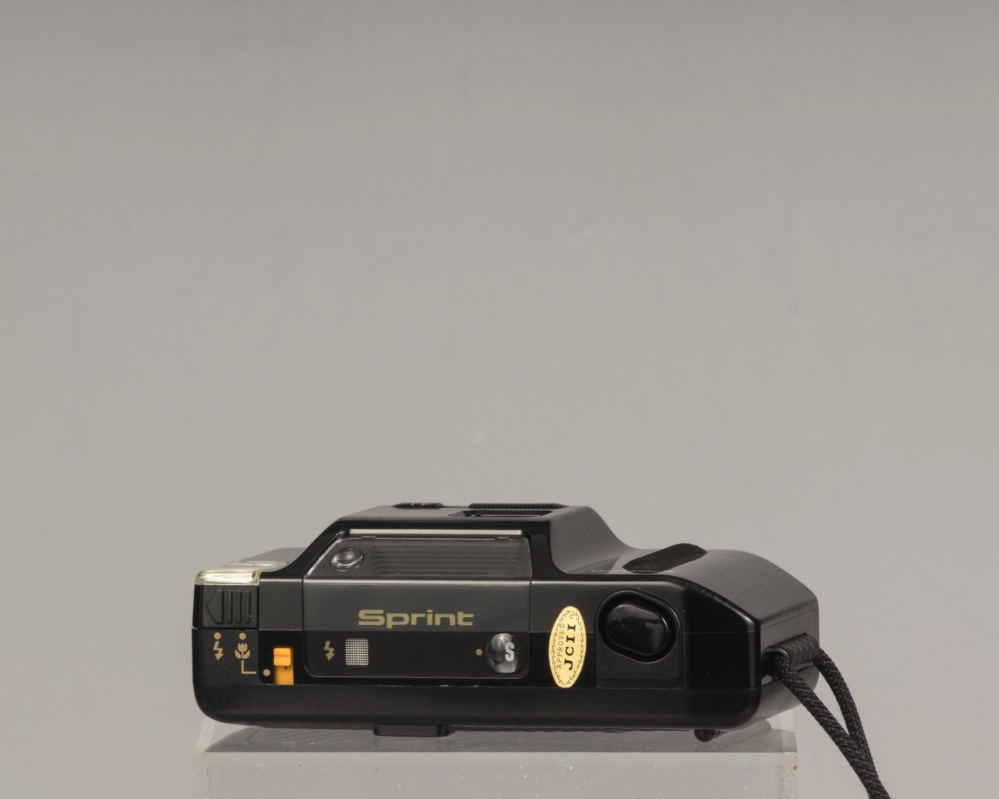 The Canon Sprint is an auto focus 35mm film point-and-shoot camera featuring a fixed 35mm f3.5 lens