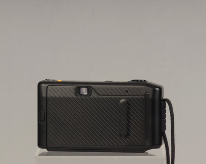 The Canon Sprint is an auto focus 35mm film point-and-shoot camera featuring a fixed 35mm f3.5 lens