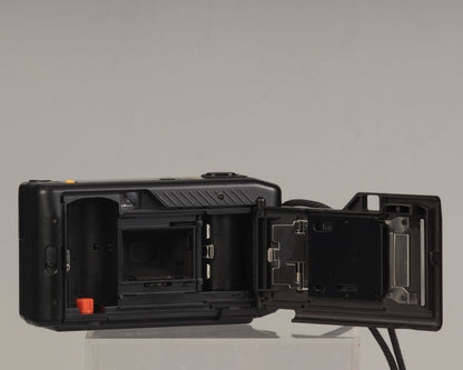 The Canon Sprint is an auto focus 35mm film point-and-shoot camera featuring a fixed 35mm f3.5 lens
