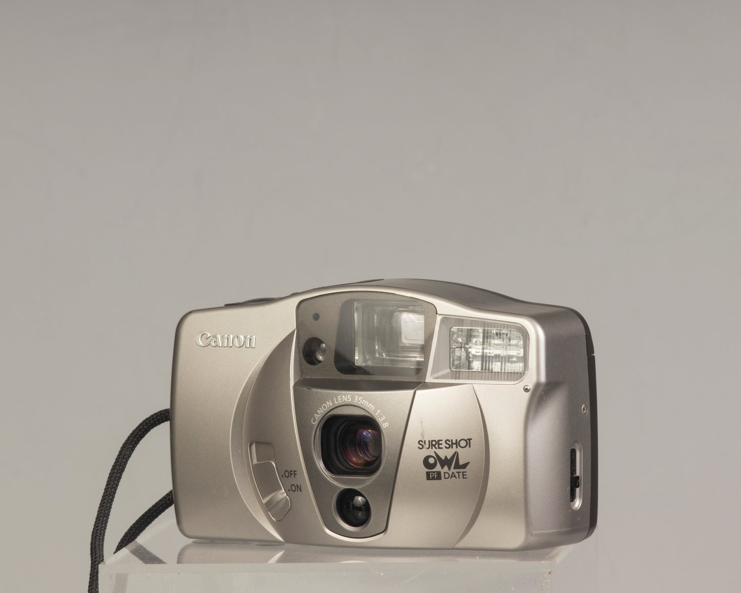 Canon Sure Shot Owl PF Date: a point-and-shoot 35mm film camera with a 35mm f/3.8 lens