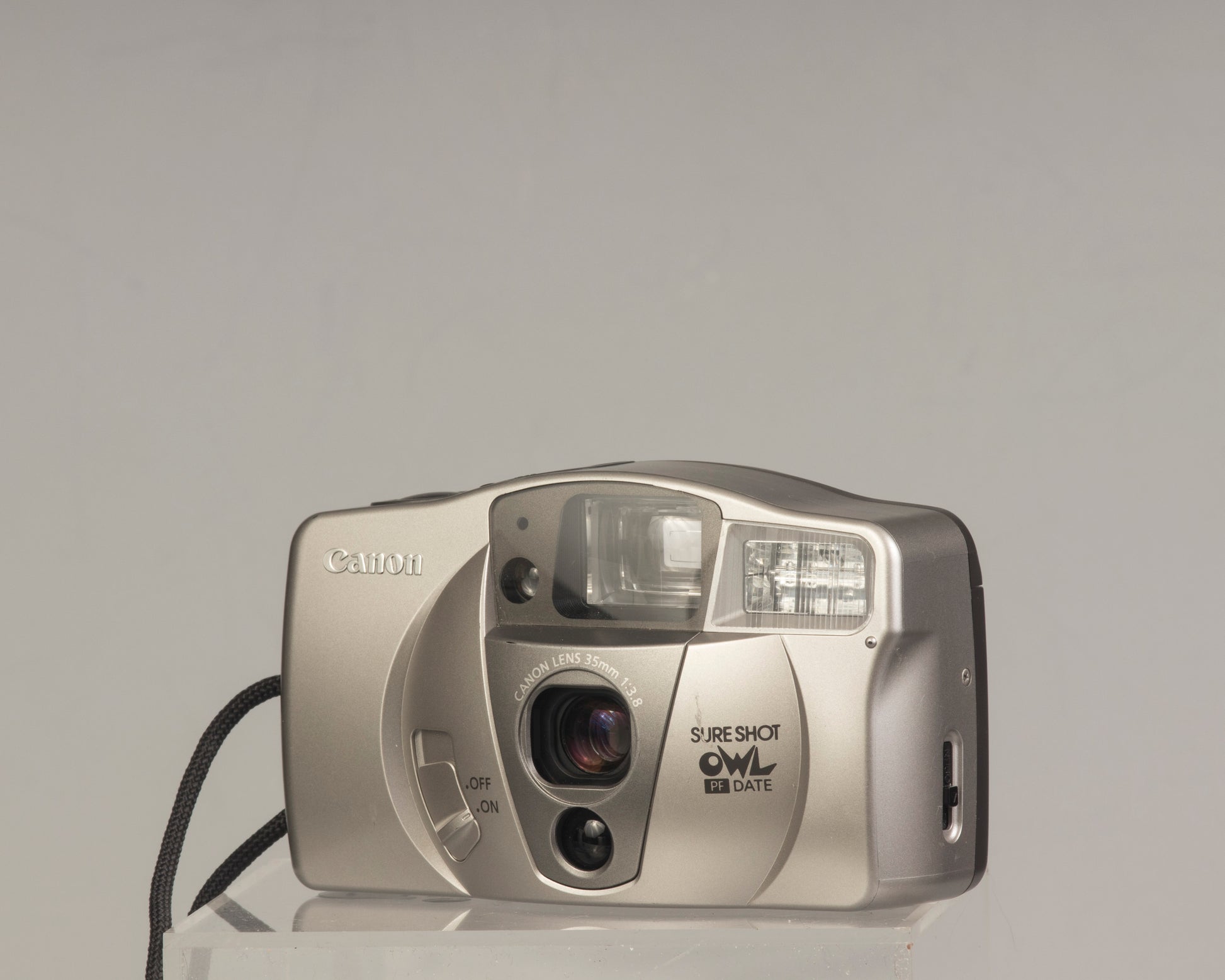 Canon Sure Shot Owl PF Date: a point-and-shoot 35mm film camera with a 35mm f/3.8 lens