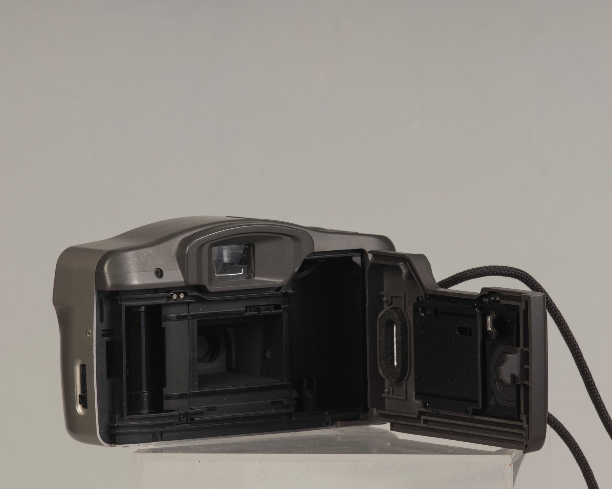 Canon Sure Shot Owl PF Date (film door): a point-and-shoot 35mm film camera with a 35mm f/3.8 lens