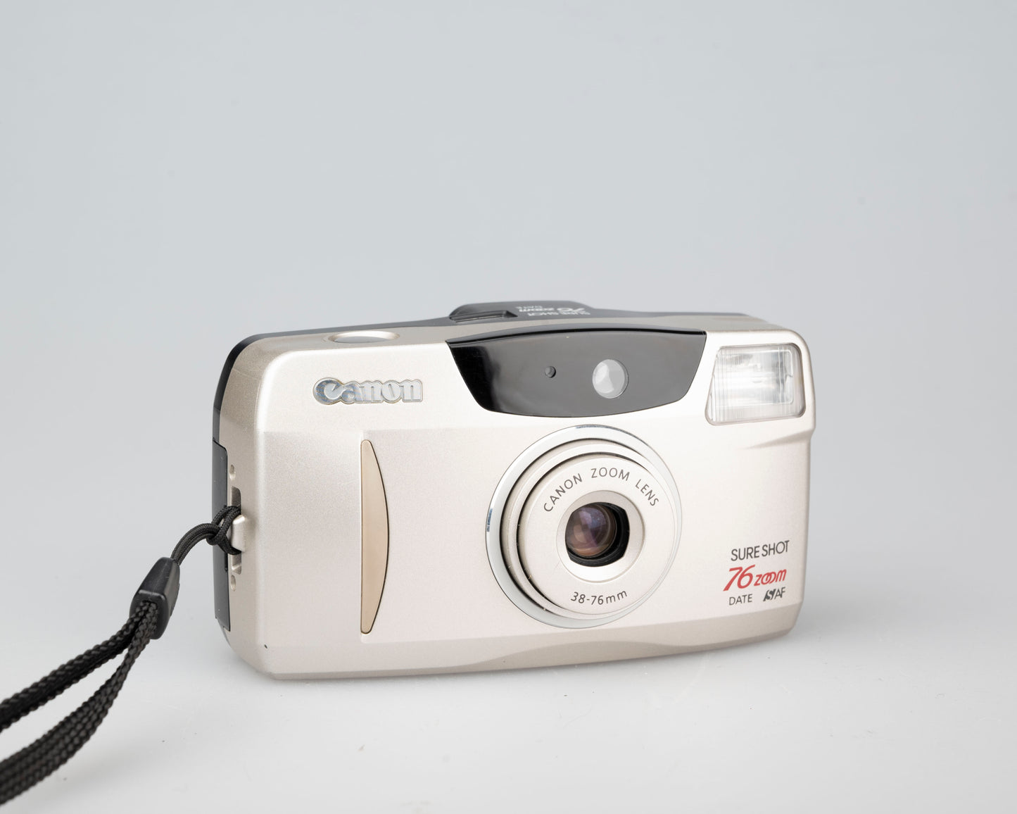Canon Sure Shot 76 Zoom Date 35mm film camera w/ case (serial 4665893)