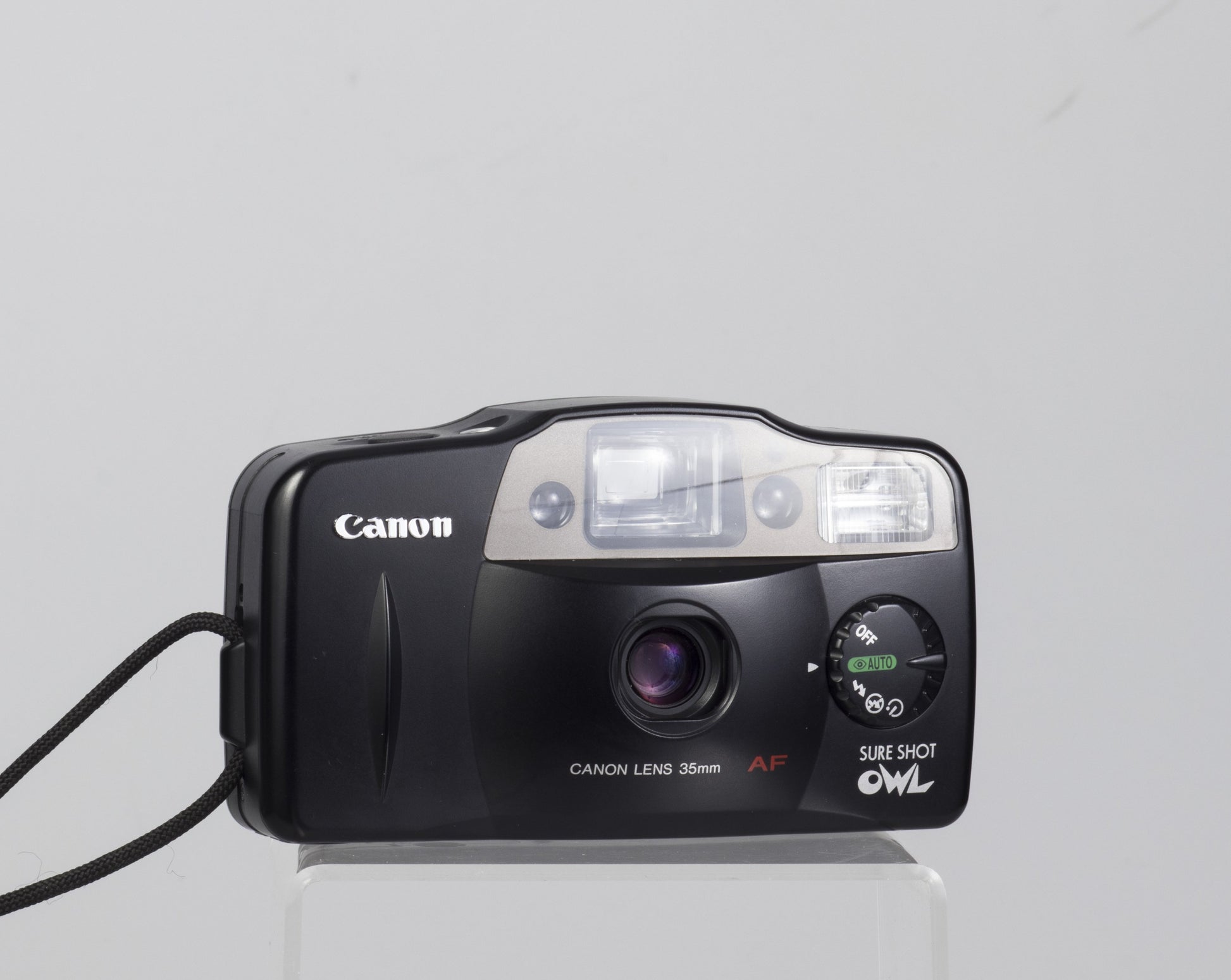 The Canon Sure Shot Owl (1997 version with dial). This 35mm compact camera was also sold as the Prima AF-8.