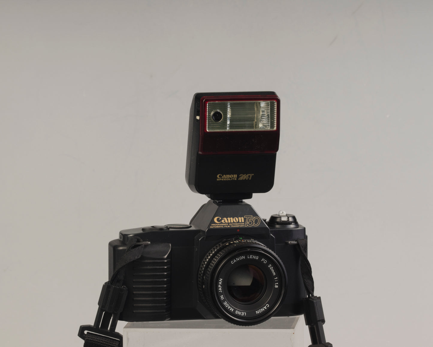 The Canon T50 35mm film SLR with the Canon FD 50mm f1.8 lens and Canon 244T Speedlite