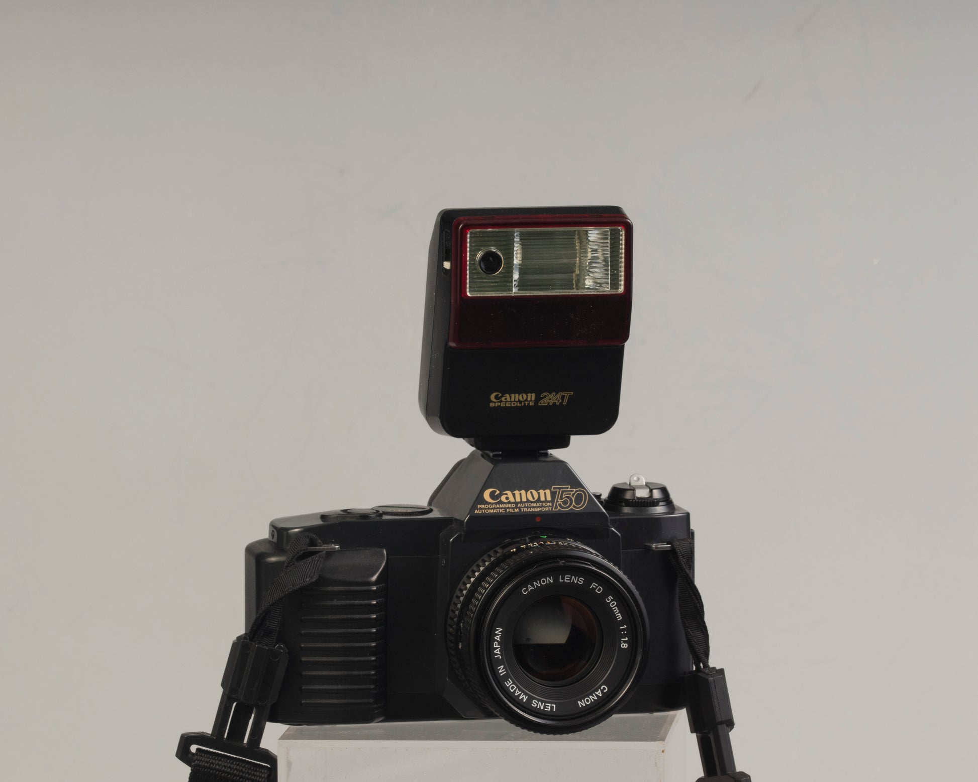 The Canon T50 35mm film SLR with the Canon FD 50mm f1.8 lens and Canon 244T Speedlite