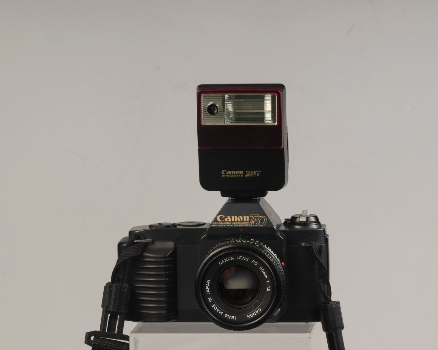 The Canon T50 35mm film SLR with the Canon FD 50mm f1.8 lens and Canon 244T Speedlite