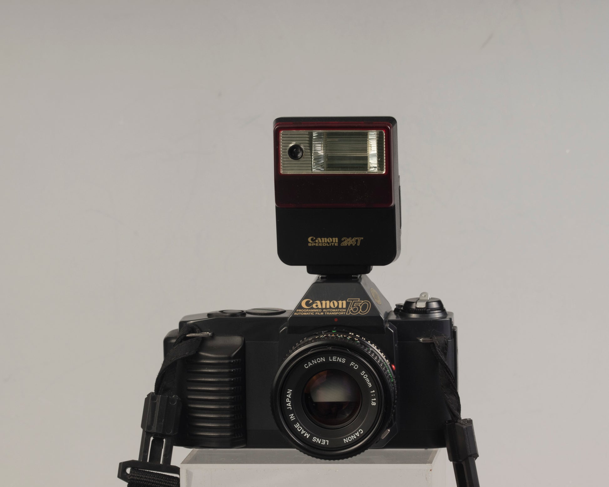 The Canon T50 35mm film SLR with the Canon FD 50mm f1.8 lens and Canon 244T Speedlite