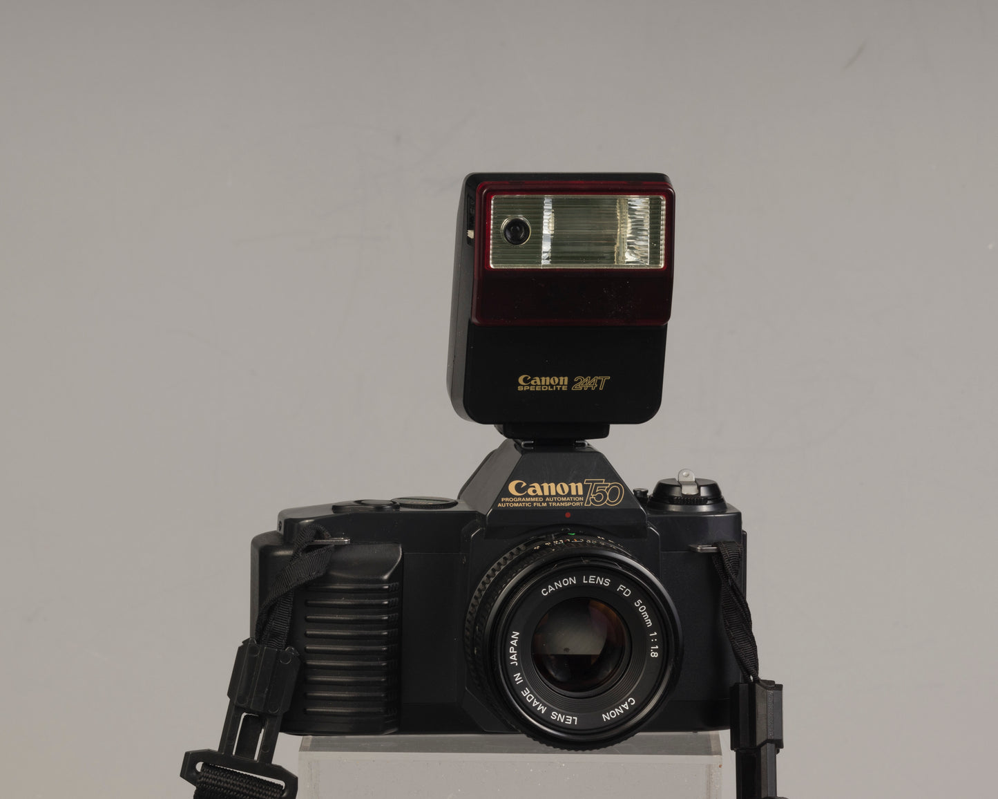 The Canon T50 35mm film SLR with the Canon FD 50mm f1.8 lens and Canon 244T Speedlite
