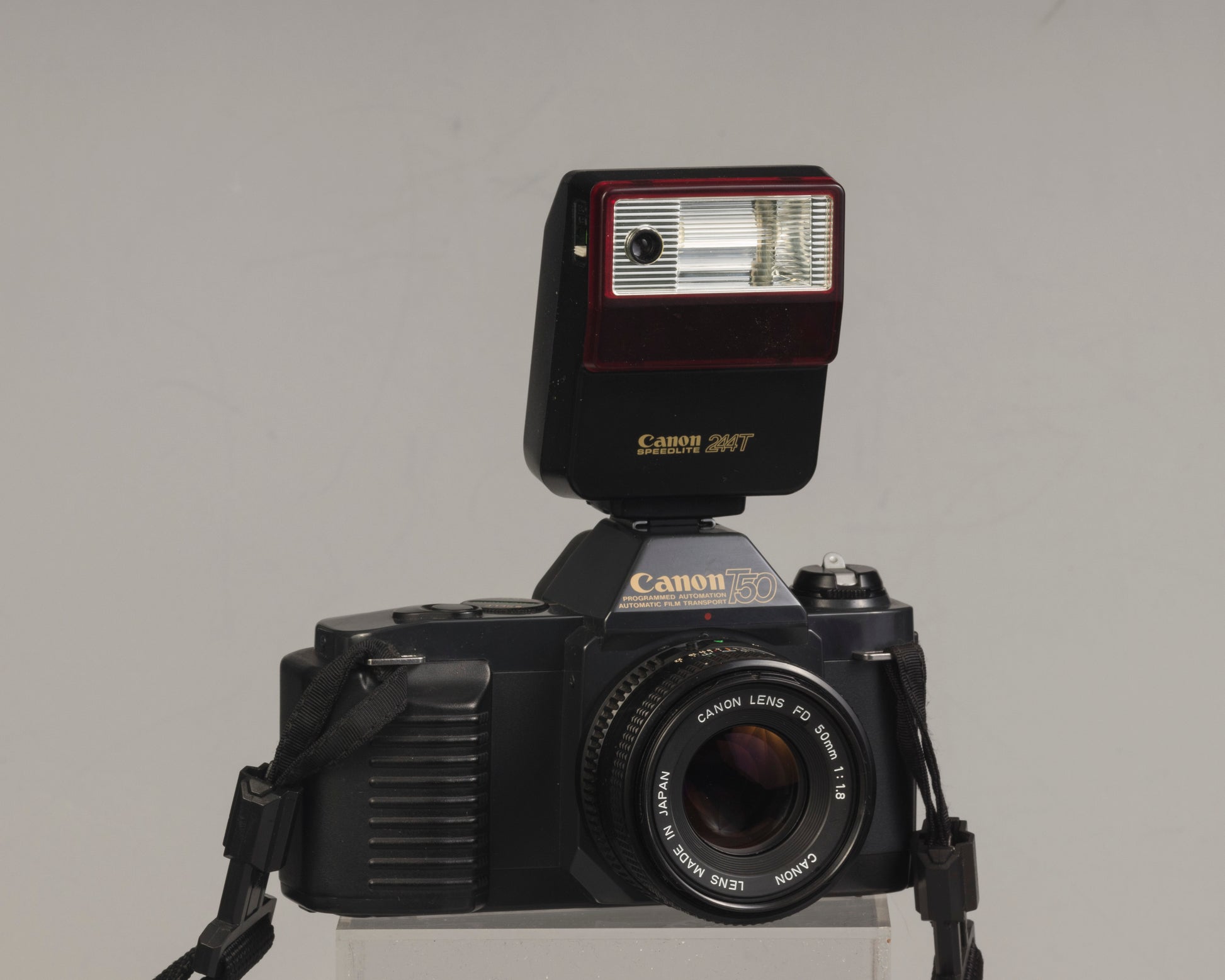 The Canon T50 35mm film SLR with the Canon FD 50mm f1.8 lens and Canon 244T Speedlite
