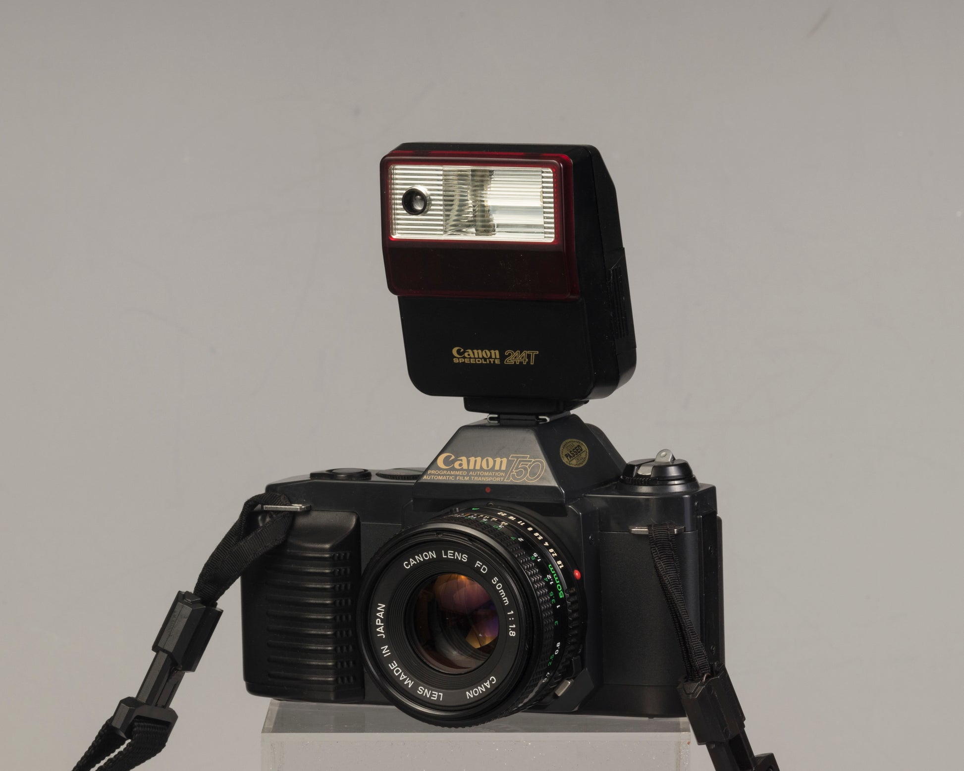 The Canon T50 35mm film SLR with the Canon FD 50mm f1.8 lens and Canon 244T Speedlite