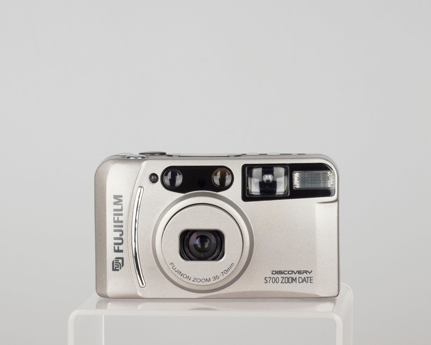 The Fujifilm Discovery S700 Zoom Date is a compact 35mm zoom camera from circa 2003
