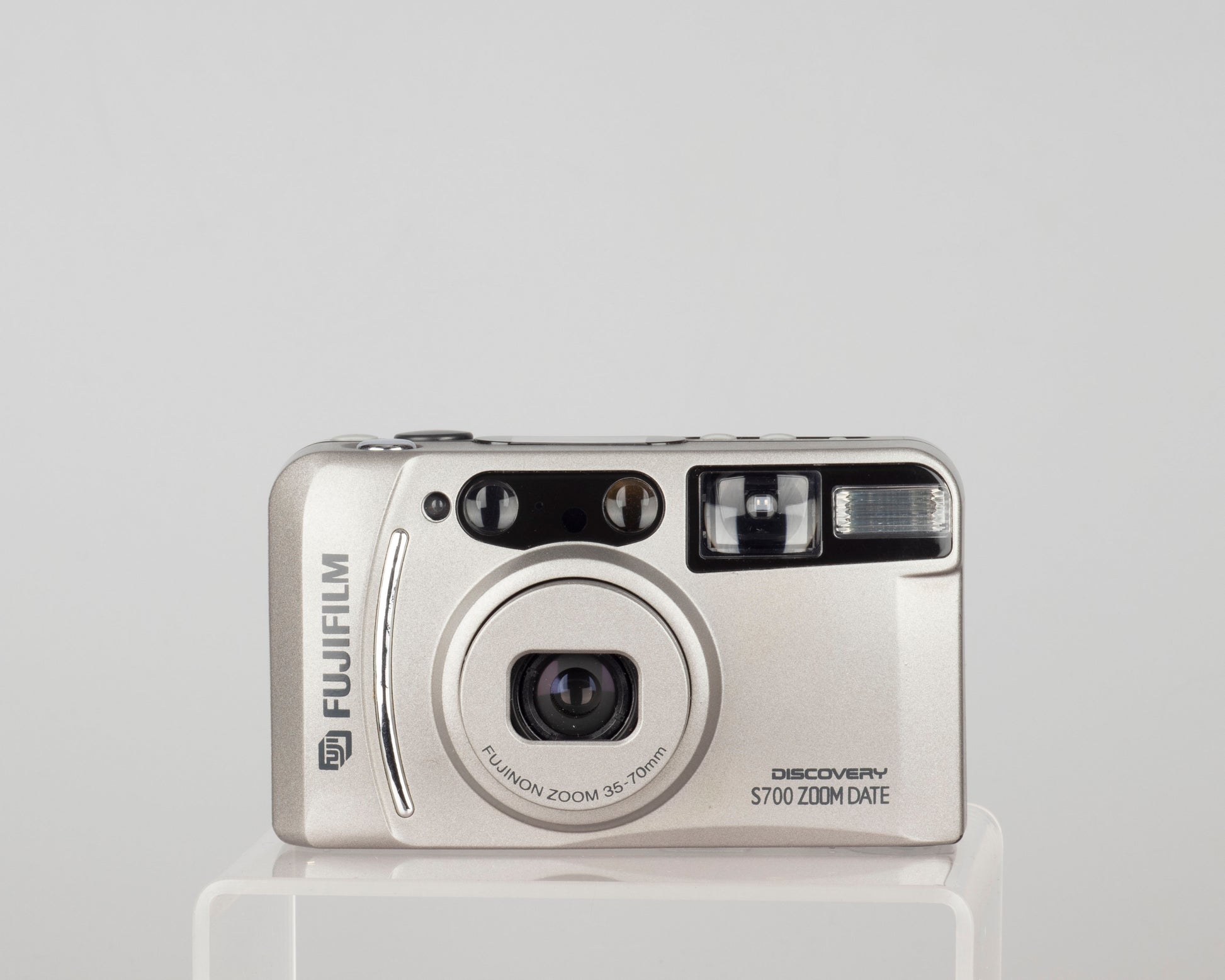 The Fujifilm Discovery S700 Zoom Date is a compact 35mm zoom camera from circa 2003