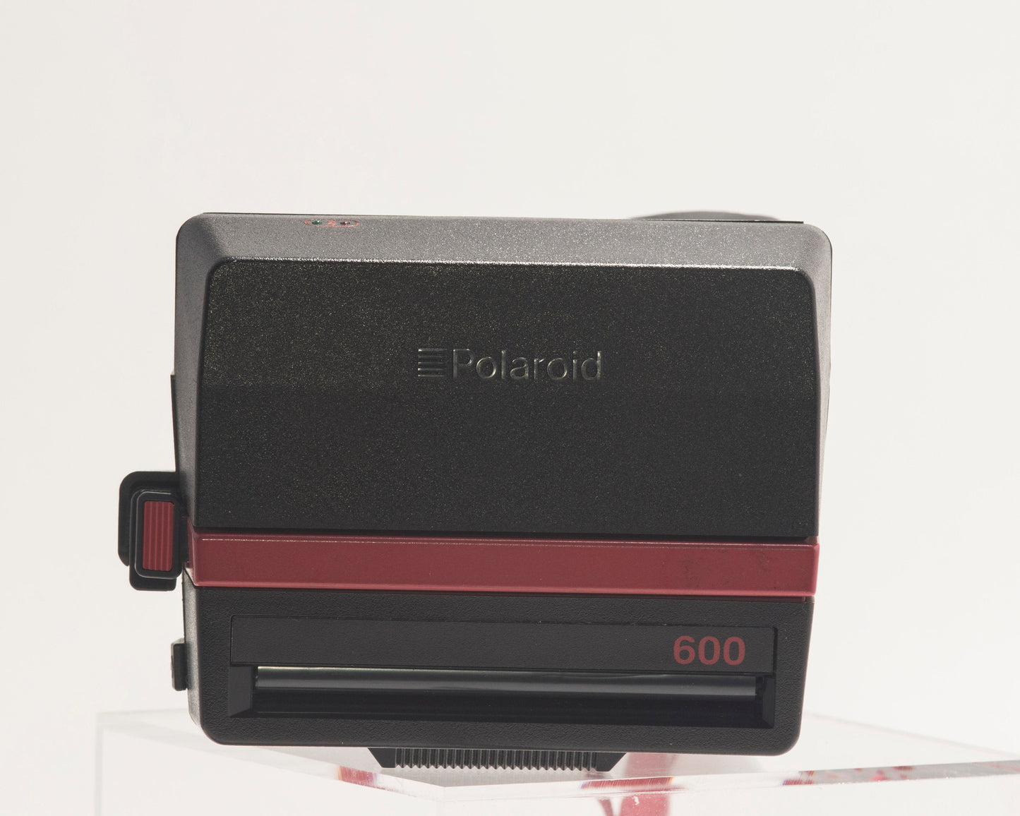 Red Polaroid 600 Cool Cam instant camera