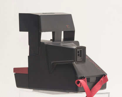 Red Polaroid 600 Cool Cam instant camera