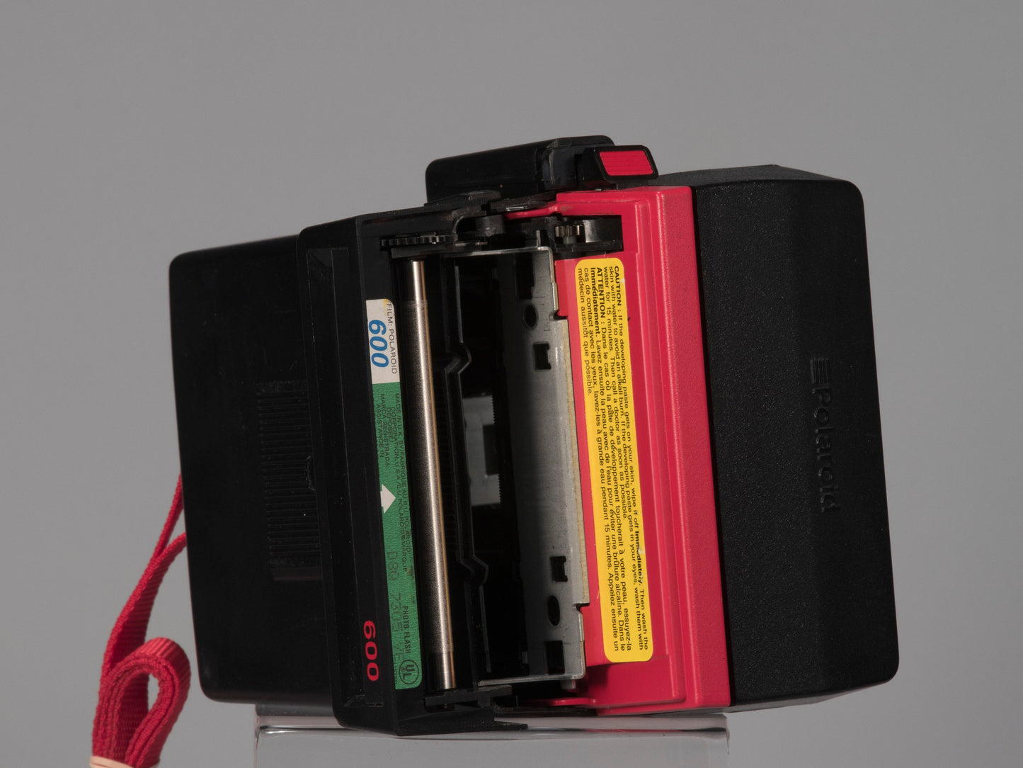 Red Polaroid 600 Cool Cam instant camera