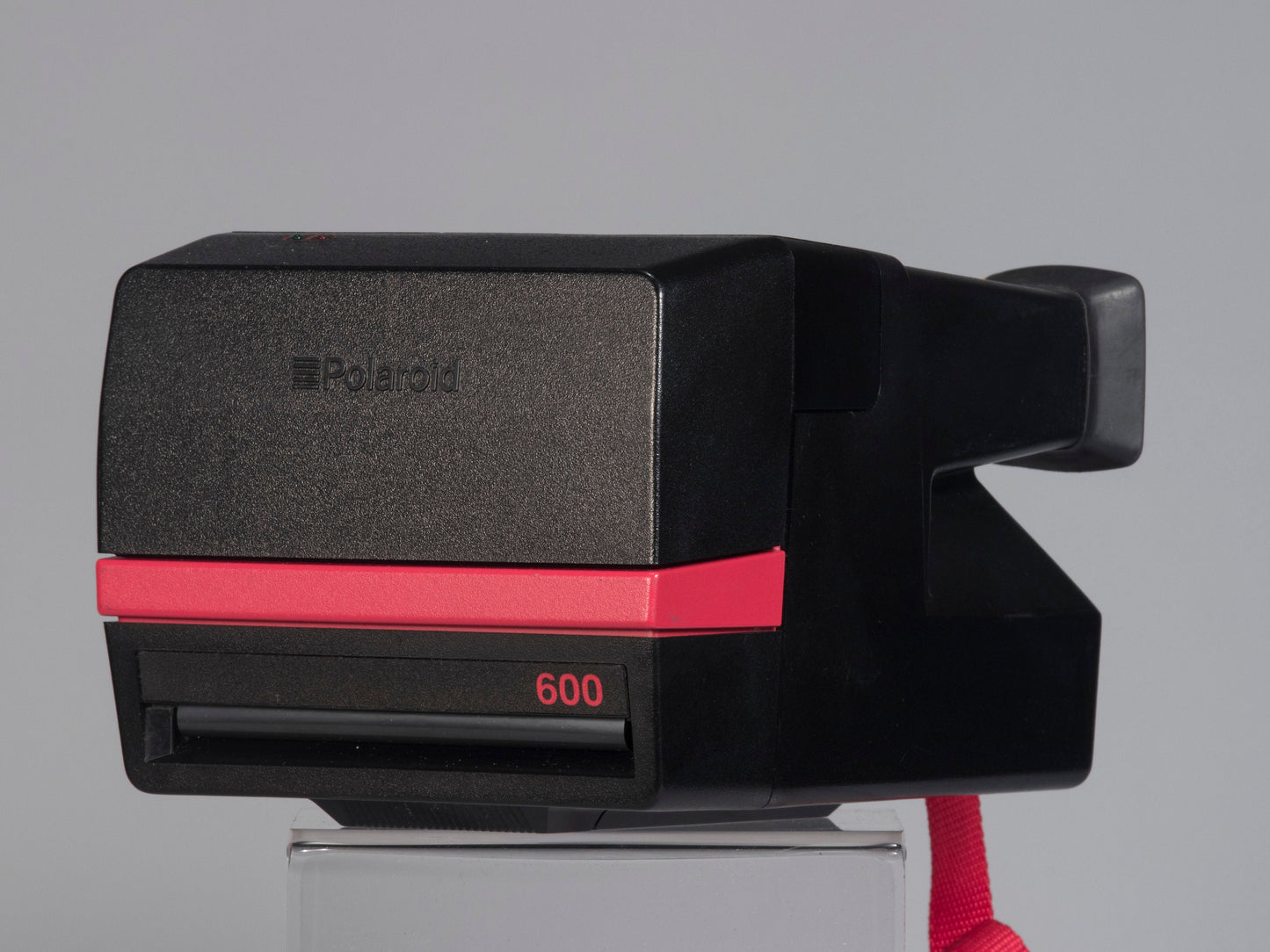 Red Polaroid 600 Cool Cam instant camera