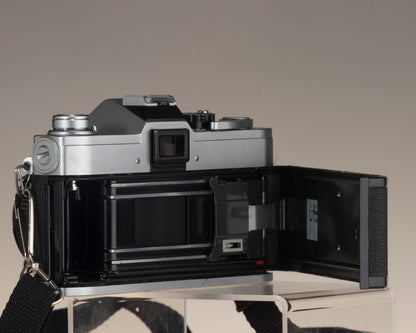 Canon FTb 35mm SLR camera with Canon FD 1:1.8 lens. Open back.