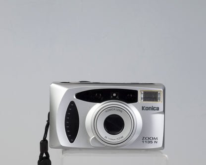 The Konica Zoom 1135 N is a compact 35mm camera that is nearly identical to the better-known Z-up 100VP