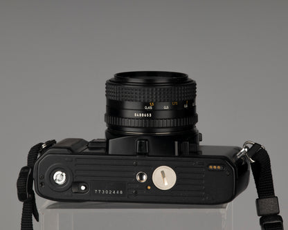 Minolta X-9 35 mm SLR avec objectif Minolta MD 50 mm f1.7 + étui toujours prêt