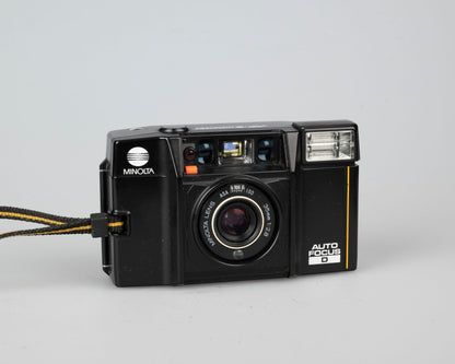 Minolta AF-S Quartz Auto Focus D " 35mm camera (serial 5004699)