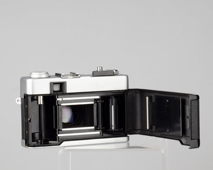 Minolta Hi-Matic 7SII 35mm rangefinder camera with half-case and Minolta 20 flash