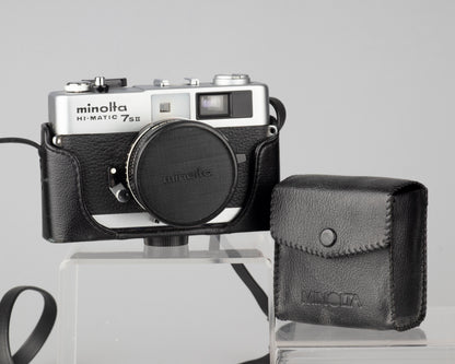 Minolta Hi-Matic 7SII 35mm rangefinder camera with half-case and Minolta 20 flash