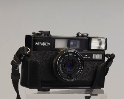 Minolta Hi-Matic S2 35mm camera w/ original case; flash not functional, otherwise works great