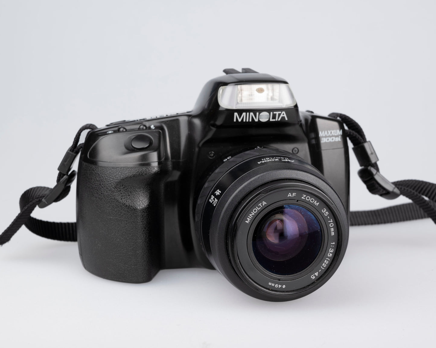 Minolta Maxxum 300si 35mm film SLR avec objectif 35-70mm + manuel