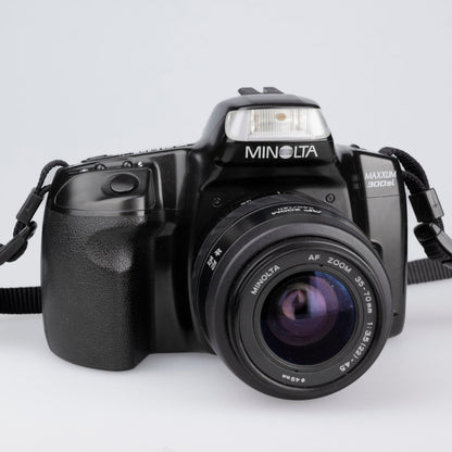Minolta Maxxum 300si 35mm film SLR avec objectif 35-70mm + manuel