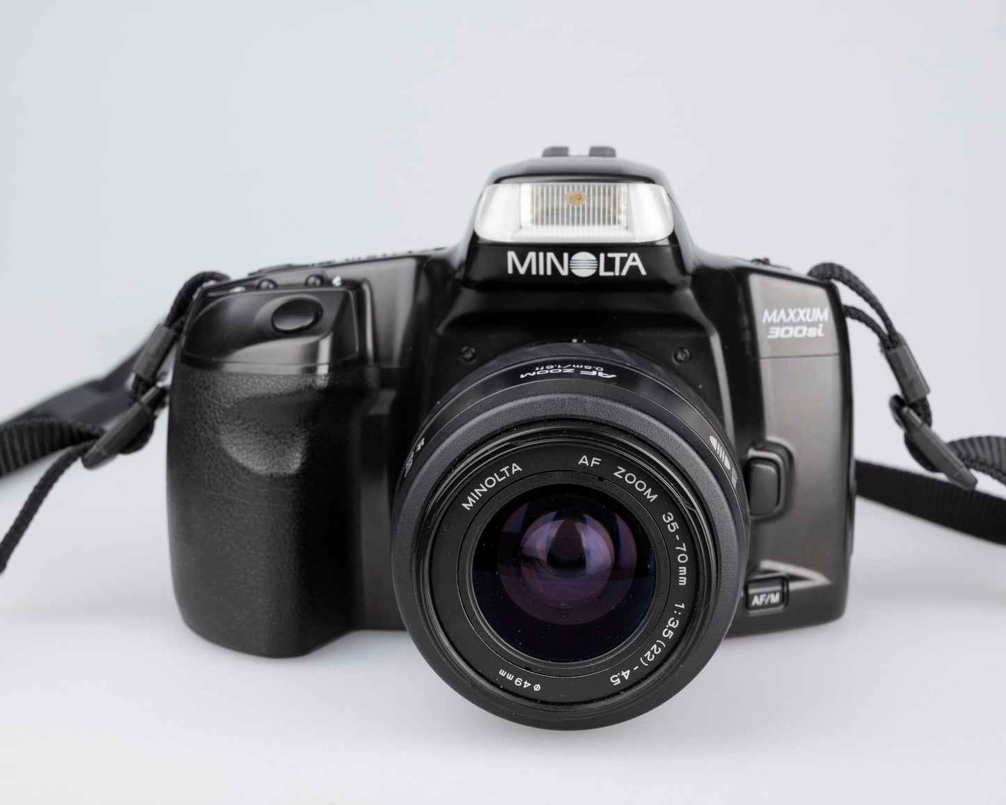 Minolta Maxxum 300si 35mm film SLR avec objectif 35-70mm + manuel
