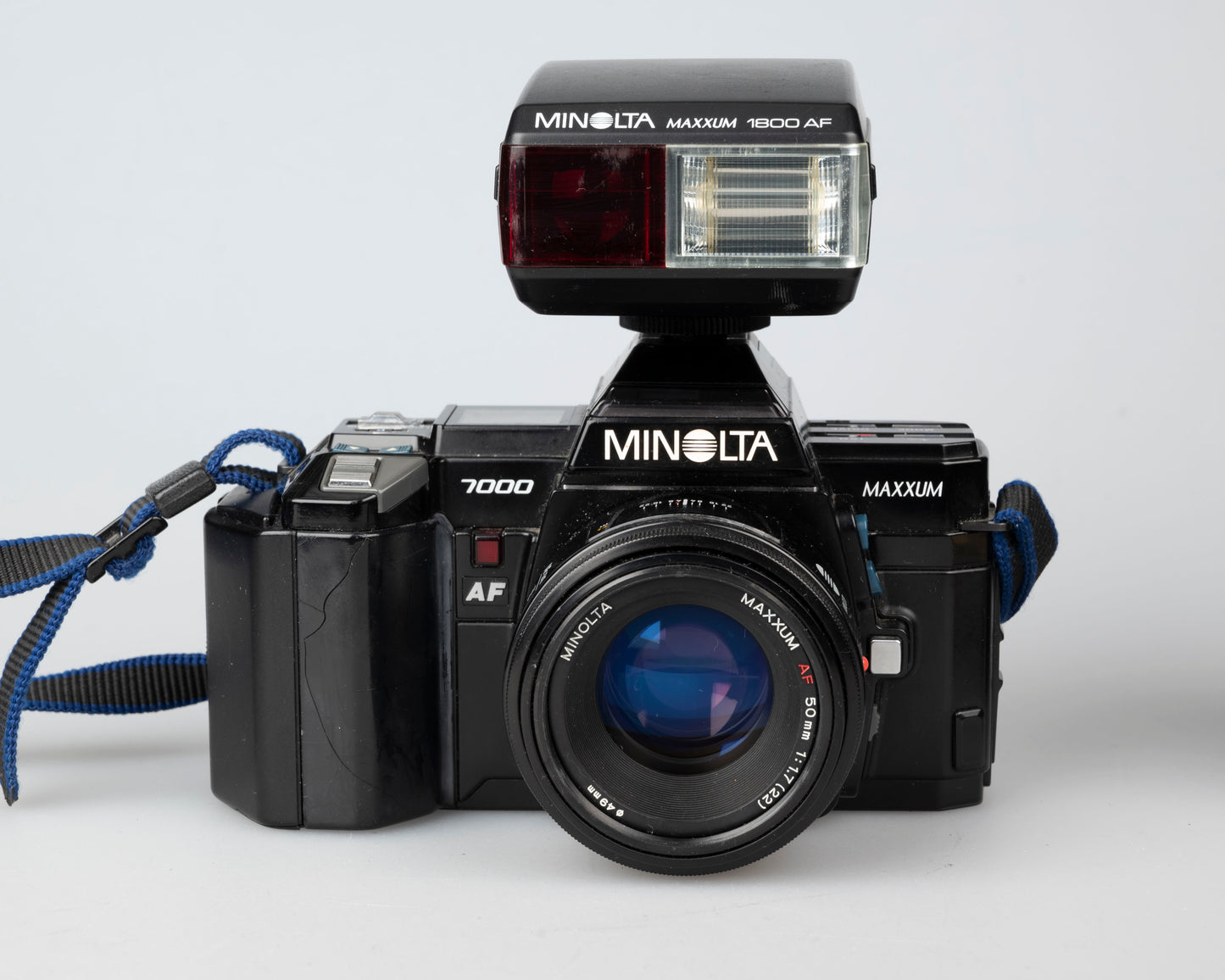Minolta Maxxum 7000 35mm film SLR w/ 50mm f1.7 lens + 1800AF flash (serial 37101091)