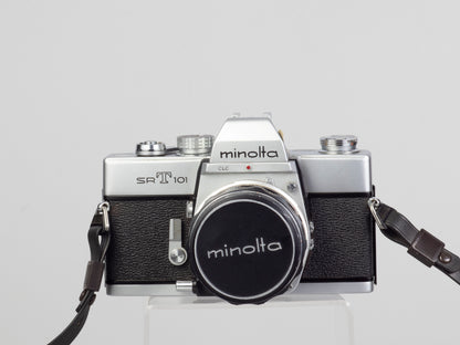 The Minolta SRT-101 35mm film SLR camera with MC Rocker PF 55mm f1.7 lens