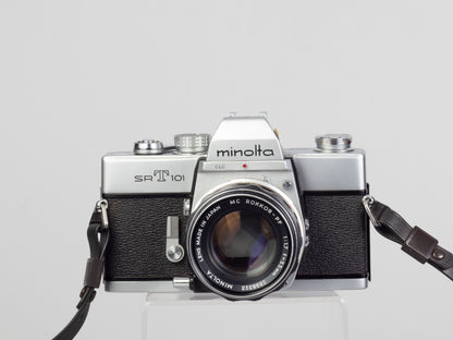 The Minolta SRT-101 35mm film SLR camera with MC Rocker PF 55mm f1.7 lens