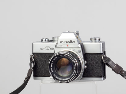 The Minolta SRT-101 35mm film SLR camera with MC Rocker PF 55mm f1.7 lens
