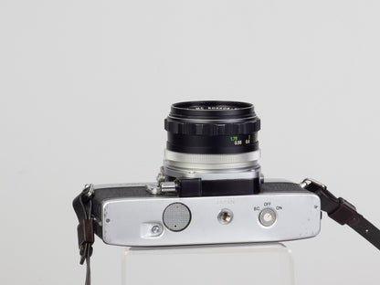 The Minolta SRT-101 35mm film SLR camera with MC Rocker PF 55mm f1.7 lens