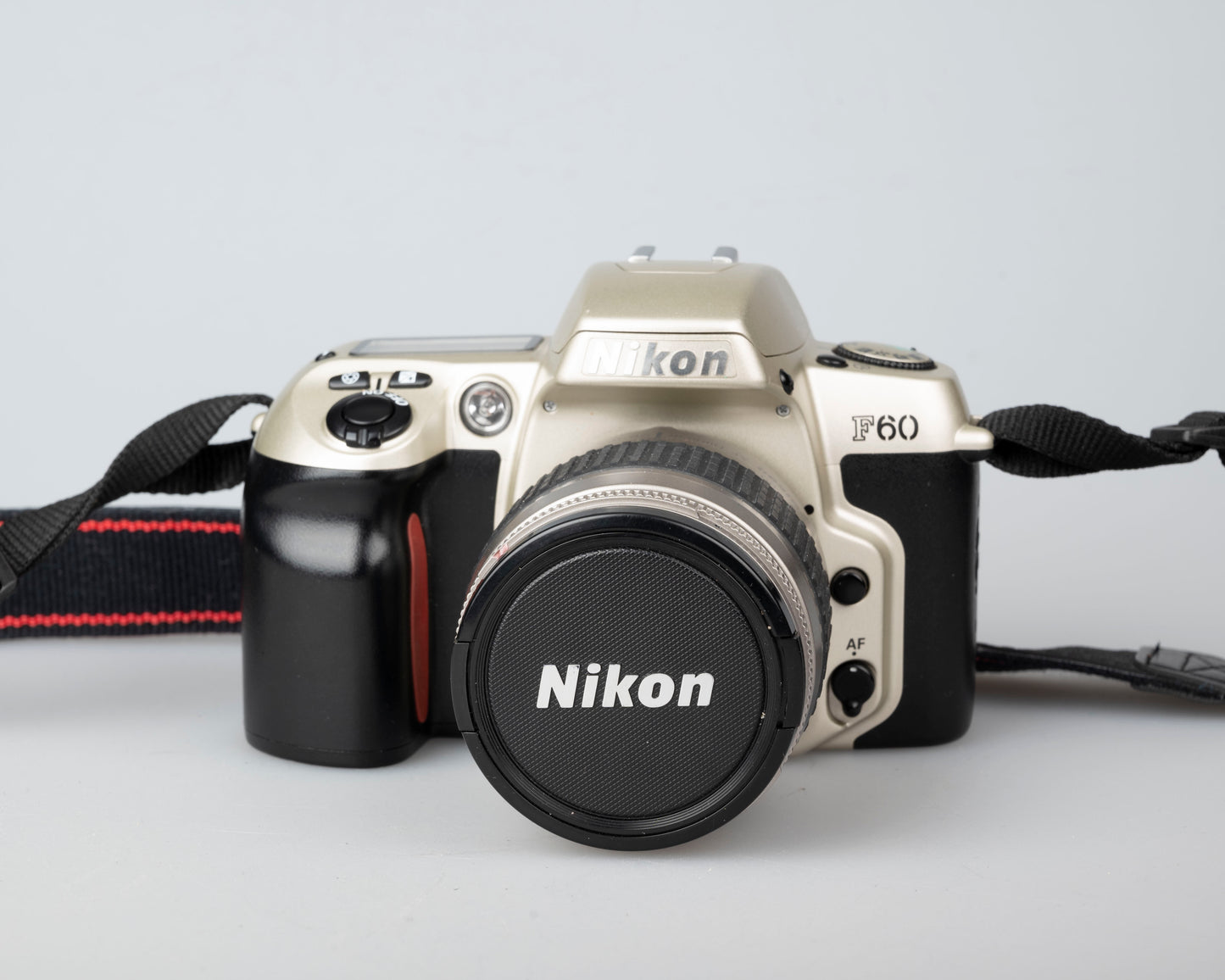 Nikon F60 35mm film SLR w/ AF Nikkor 28-80mm lens + manual (serial 2341515)