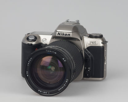 Nikon F65 (alias N65) Reflex 35 mm avec boîte d'origine et manuel + objectif Tokina AF 28-210 mm