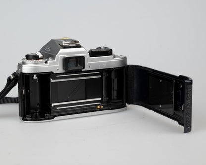 Appareil photo reflex Nikon FG 35 mm avec objectif 50 mm f1.8 et étui toujours prêt