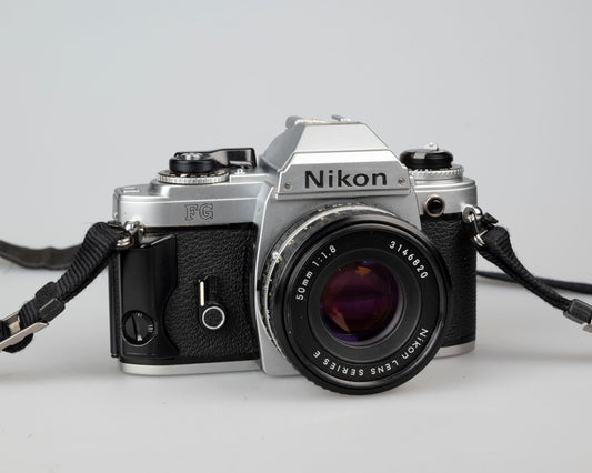 Nikon FG 35mm film SLR camera with 50mm f1.8 lens and ever-ready case