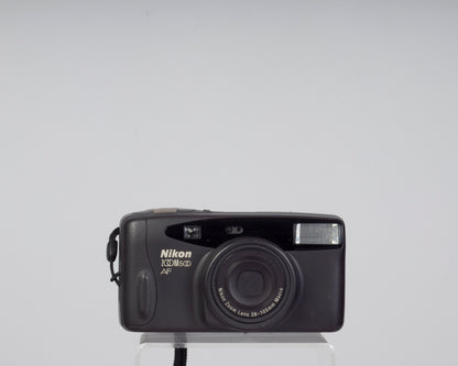 Nikon Zoom 500AF 35mm camera with case and manual (serial 7062642)