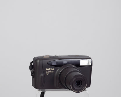 Nikon Zoom 500AF 35mm camera with case and manual (serial 7062642)