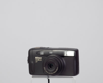 Nikon Zoom 500AF 35mm camera with case and manual (serial 7062642)