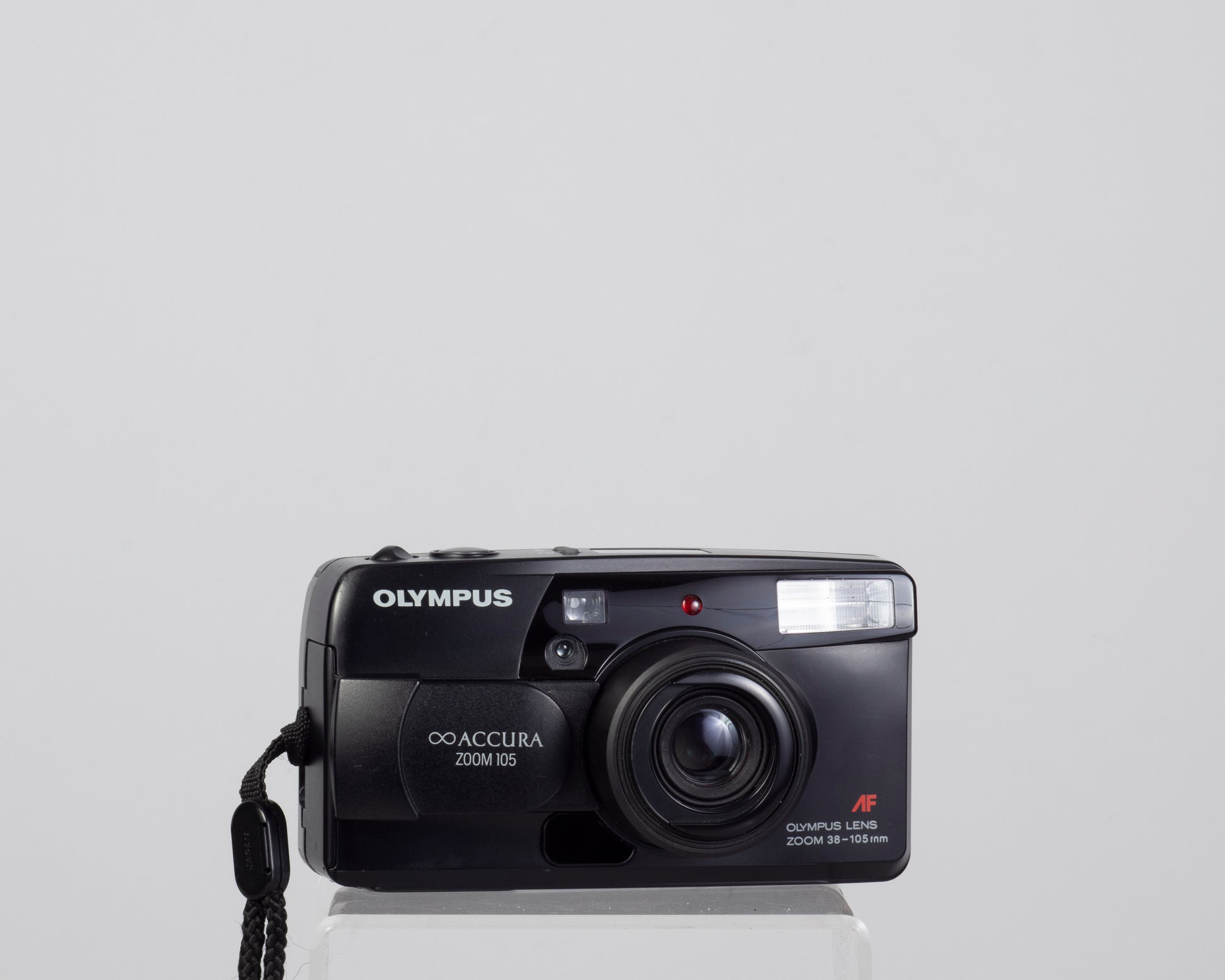 The Olympus Infinity Accura Zoom 105 35mm film camera with 38-105mm zoom lens