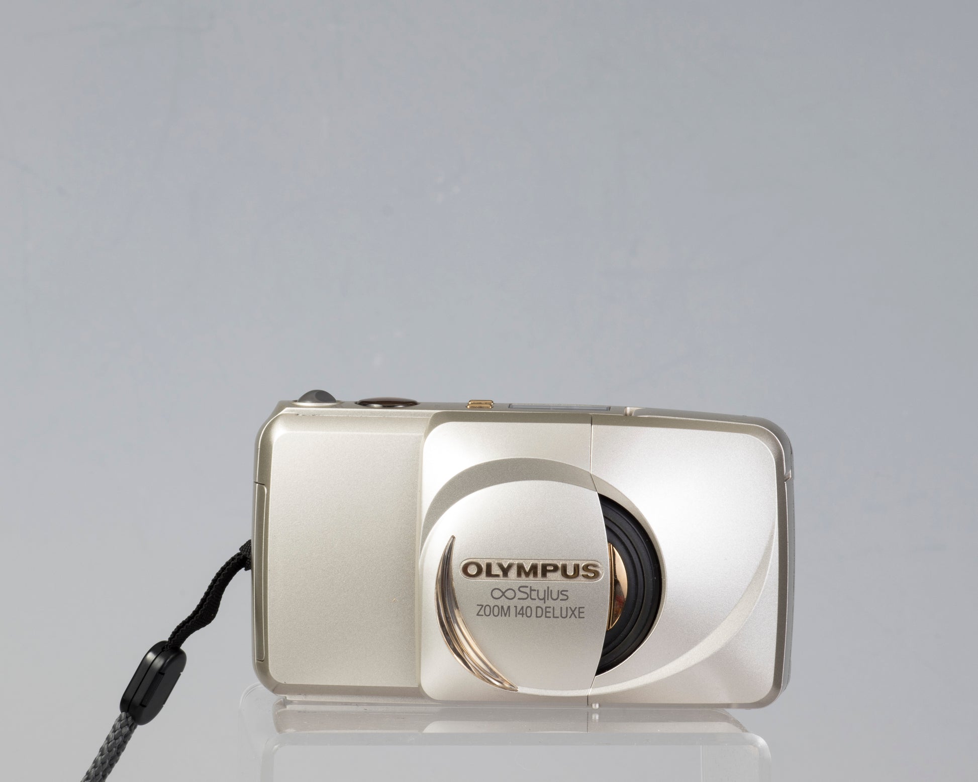 Olympus Infinity Stylus 140 Deluxe 35mm point-and-shoot camera (closed)