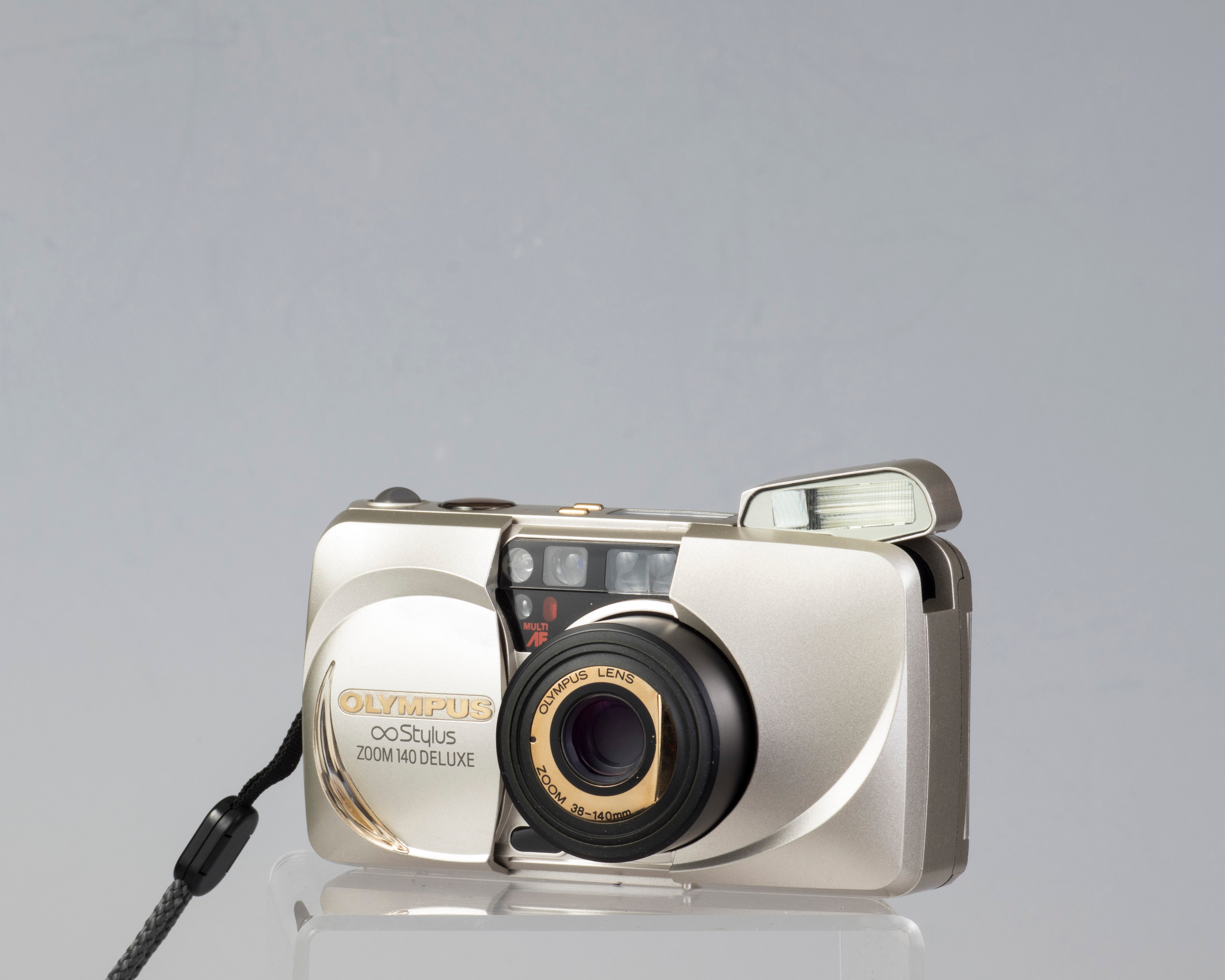 Olympus ∞ Stylus Zoom 140 Deluxe 35mm film camera (serial 4014772